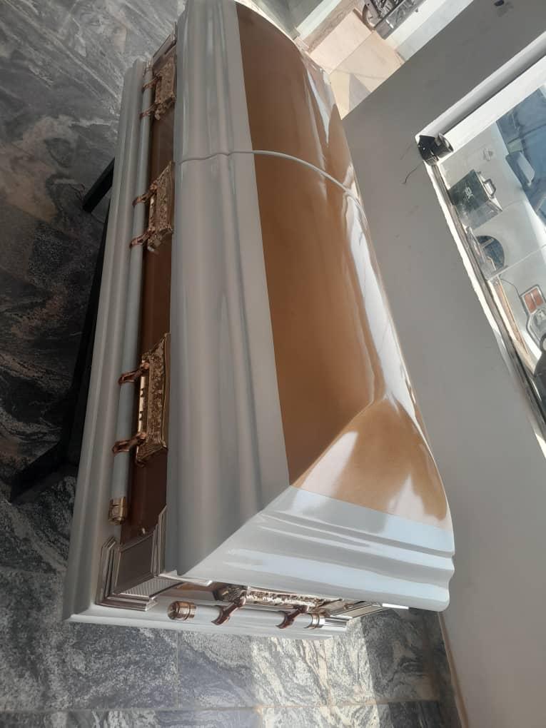 Open white casket